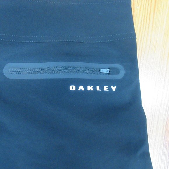 NEW! OAKLEY UNLINED PERFORMANCE FIT POLY/ELASTANE SWIM SHORTS BLACK Sz 32 - Picture 5 of 6